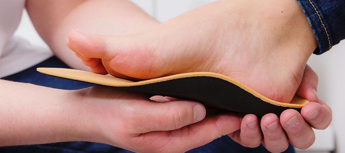 Fuß mit orthopädischer Einlage zur Druckentlastung